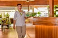 Young asian beautiful waitress smiling