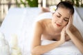 Young asian beautiful woman in spa, Natural Thai massage in spa, Asian woman on massage bed relax and lifestyle, Body care, Spa Royalty Free Stock Photo