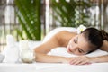 Young asian beautiful woman in spa, Natural Thai massage in spa, Asian woman on massage bed relax and lifestyle, Body care, Spa Royalty Free Stock Photo