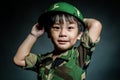 Young asian boy dressed like a soldier Royalty Free Stock Photo