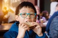 Boy eating sandwich for lunch Royalty Free Stock Photo