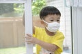Young Asian boy and girl with face mask protection from coronavirus illnesses
