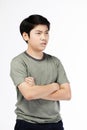 Young Asian boy over white background, be upset; have a bad temper emotional