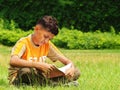 Young asian boy studying Royalty Free Stock Photo