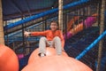 Boy sitting on big ball at in door playground Royalty Free Stock Photo