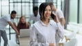 young asian business lady in white shirt talking on the phone Royalty Free Stock Photo