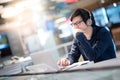 Young Asian business man feeling stressed while working with lap Royalty Free Stock Photo