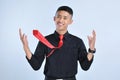 Young asian business man happy and excited celebrating, expressing big success, yelling celebrating, winning gesture Royalty Free Stock Photo