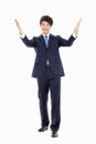 Young Asian business man showing welcom sign. Royalty Free Stock Photo