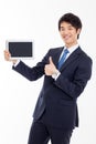 Young Asian business man using a pad PC Royalty Free Stock Photo