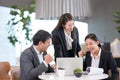 Young Asian business people are meeting in office . Group of Business team happy and success Royalty Free Stock Photo