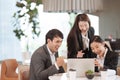 Young Asian business people are meeting in office . Group of Business team happy and successÃ Â¹Æ Royalty Free Stock Photo