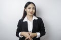 Young Asian business woman in black suit feeling serious and focus staring at camera Royalty Free Stock Photo