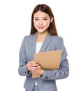 Young asian business woman holding file document Royalty Free Stock Photo