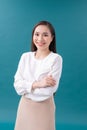 Young asian business woman isolated on blue background Royalty Free Stock Photo