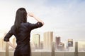 Young asian business woman looking at cityscape Royalty Free Stock Photo