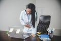 Young asian business woman person sitting at work and has stress pain in her stomach. Concept office syndrome abdomen pain from Royalty Free Stock Photo