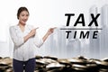 Young asian business woman pointing Tax time text Royalty Free Stock Photo