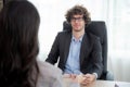 Young asian business woman sitting and job interview with caucasian manager at office. Royalty Free Stock Photo