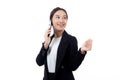 Young asian business woman in suit talking on smart phone isolated on white background. Royalty Free Stock Photo