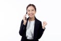 Young asian business woman in suit talking on smart phone isolated on white background. Royalty Free Stock Photo