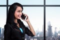 Young asian business woman using mobile phone Royalty Free Stock Photo
