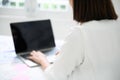 Young asian business woman working on computer laptop Royalty Free Stock Photo