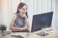 Young asian business woman working with computer . Royalty Free Stock Photo