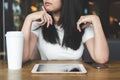 Young asian business woman working with tablet laptop, phone and Royalty Free Stock Photo