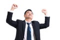 Young Asian businessman celebrating Successful. Businessman happy and smile with Arms up while standing on white background Royalty Free Stock Photo