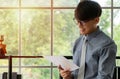 Young Asian businessman excited happy and celebrating success in the workplace after see finalizing the annual sales report. Conce Royalty Free Stock Photo