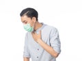 Young Asian Businessman in hygienic mask suffering sore throat Royalty Free Stock Photo