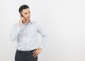 Young Asian Businessman making phone call isolated on white background. Royalty Free Stock Photo