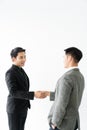 Young asian businessman shakes hands to his partner agrees to cooperate in business. / business concept / cooperate work / Royalty Free Stock Photo