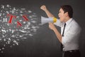 Young asian businessman using megaphone shouting notice TAX Royalty Free Stock Photo