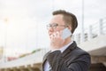 Businessman wearing black suit talking with someone Royalty Free Stock Photo