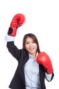 Young Asian businesswoman with boxing glove Royalty Free Stock Photo