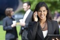 Young Asian Businesswoman On Her Cell Phone Royalty Free Stock Photo