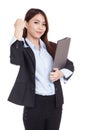 Young Asian businesswoman success with folder in hand