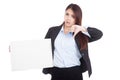 Young Asian businesswoman thumbs down show blank sign Royalty Free Stock Photo