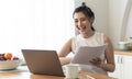 Young Asian businesswoman using computer laptop talking for video call conference meeting. work from home concept Royalty Free Stock Photo