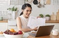 Young Asian businesswoman using computer laptop talking for video call conference meeting. work from home concept Royalty Free Stock Photo