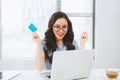 Young asian businesswoman using credit card for on-line payment Royalty Free Stock Photo