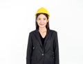 Young Asian businesswoman wearing black suit and yellow safety helmet. Portrait of female engineer looking confident Royalty Free Stock Photo