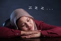 Young Businesswoman Tired, Falling Asleep at Work and Dreaming Royalty Free Stock Photo