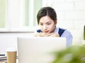 Young asian businesswoman working in office Royalty Free Stock Photo