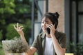 Young asian businesswoman working at office using mobile phone.. Royalty Free Stock Photo