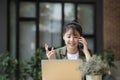 Young asian businesswoman working at office using mobile phone.. Royalty Free Stock Photo