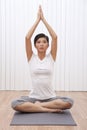 Young Asian Chinese Woman In Yoga Position Royalty Free Stock Photo