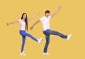 Young Asian couple being happy and dancing